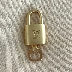 #316 Louis Vuitton Brass Lock and Key Set